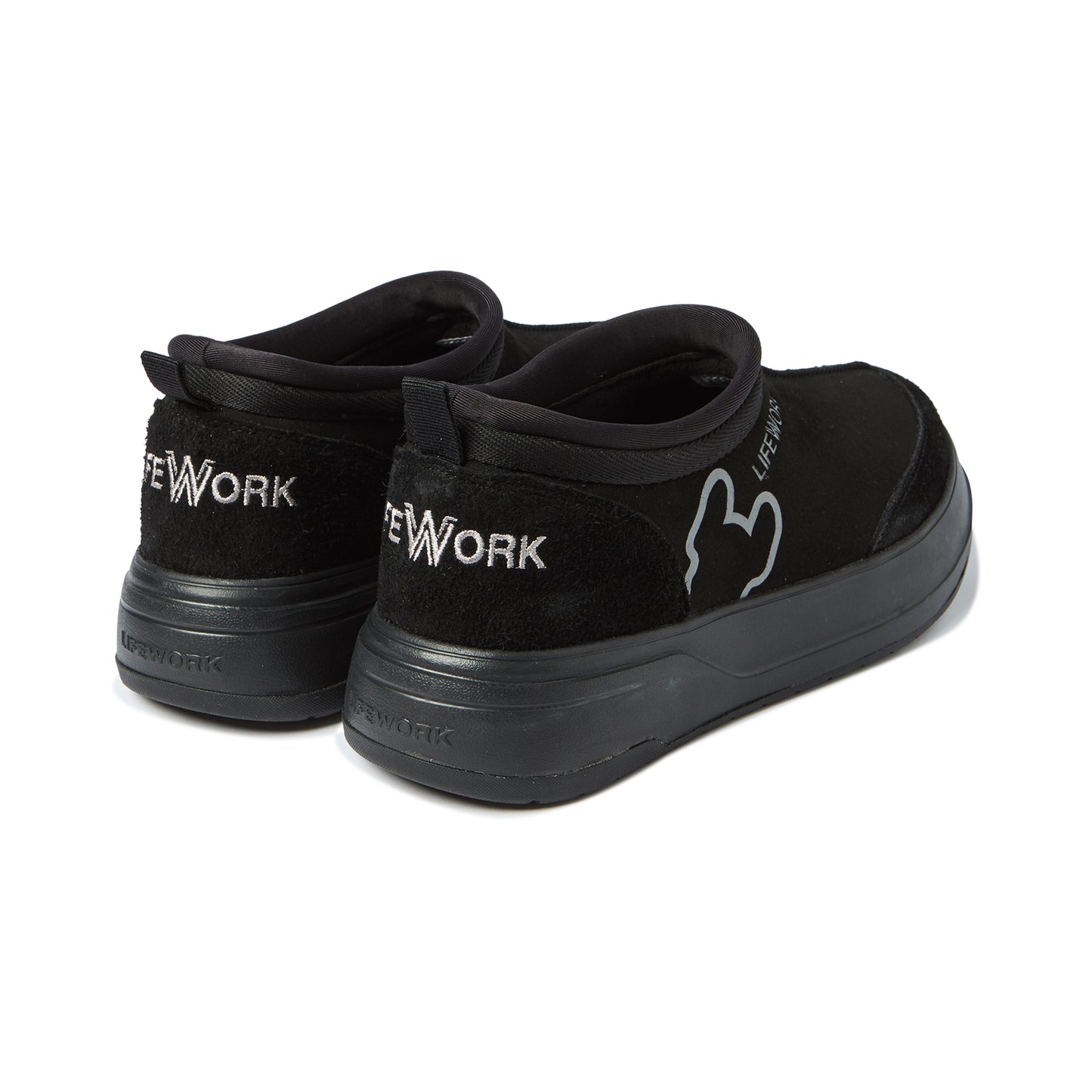 Black slip-on sneakers with 'New York' branding on a white background