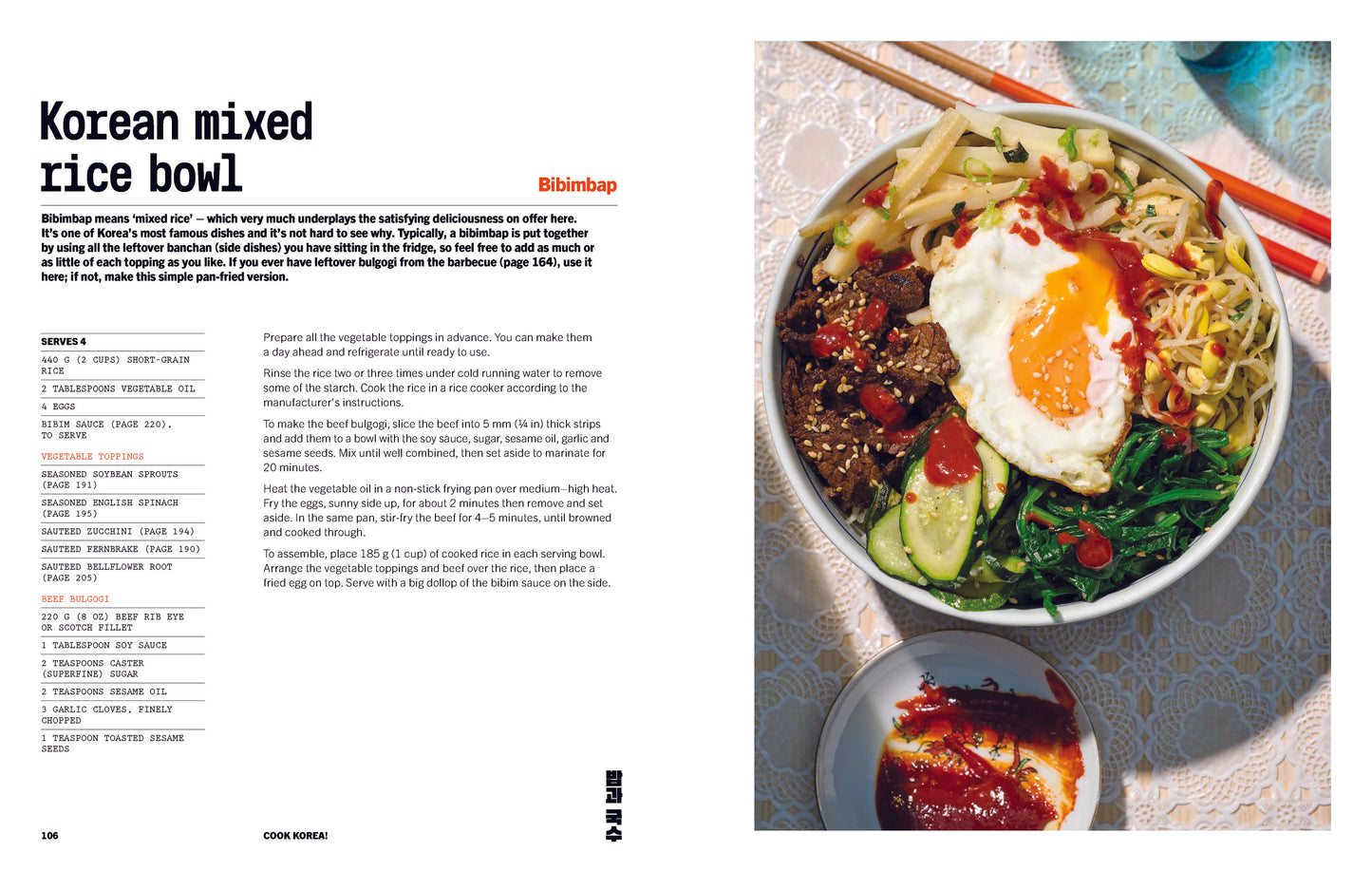 Korean mixed rice bowl (Bibimbap) with colorful vegetables, marinated beef, fried egg, and spicy gochujang sauce, served in a traditional bowl.