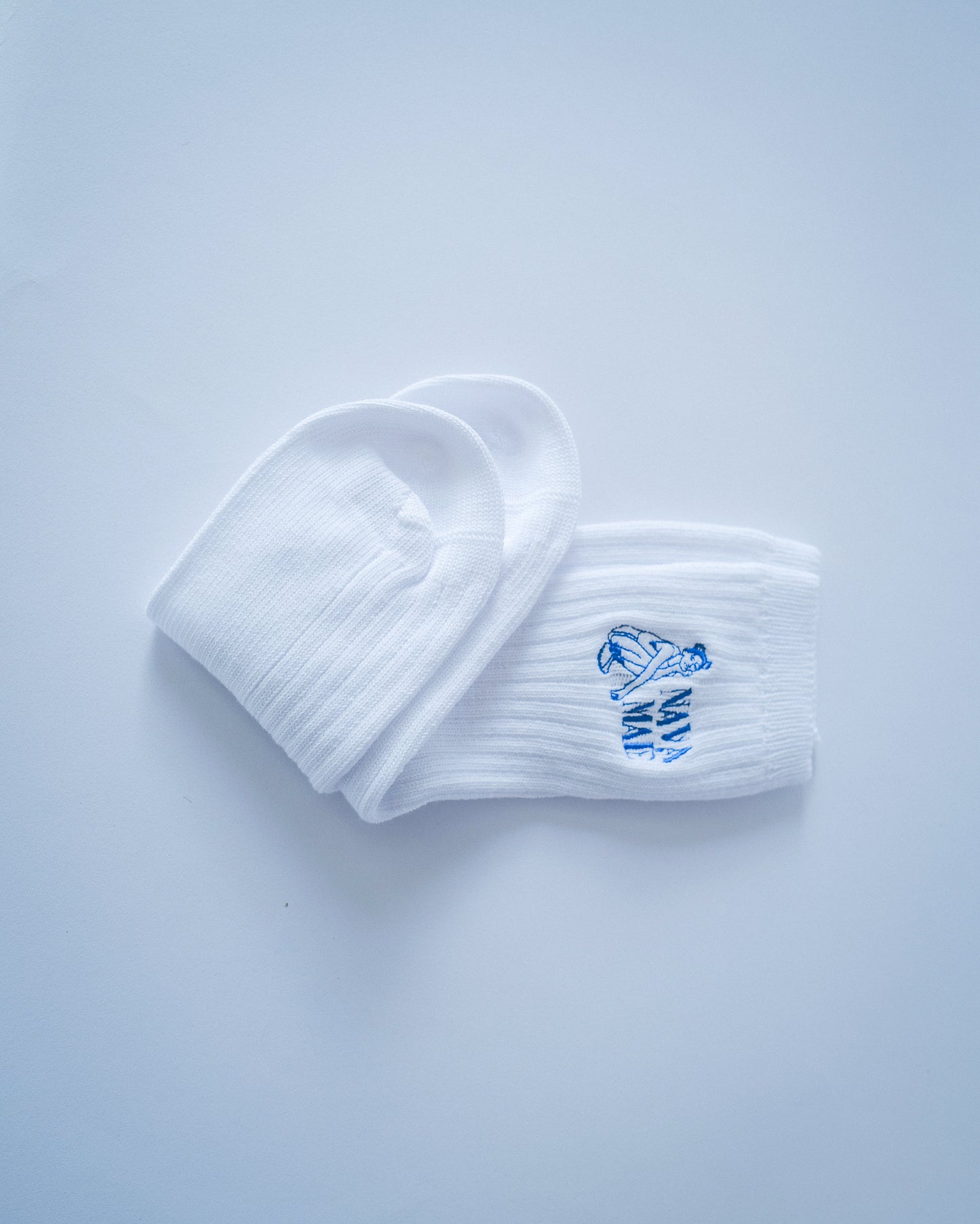 Comfortable and stylish organic cotton socks with ribbed texture and monogram design