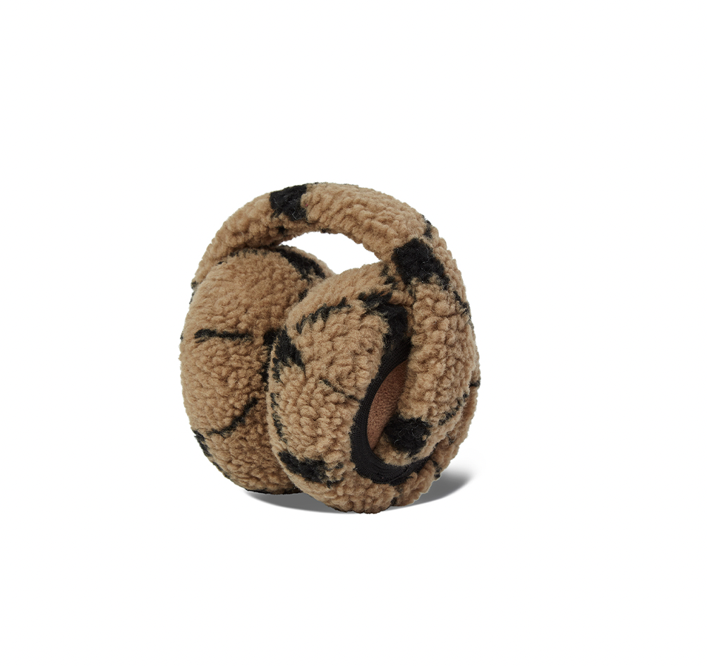 Beige ear muffs with black pattern on a white background