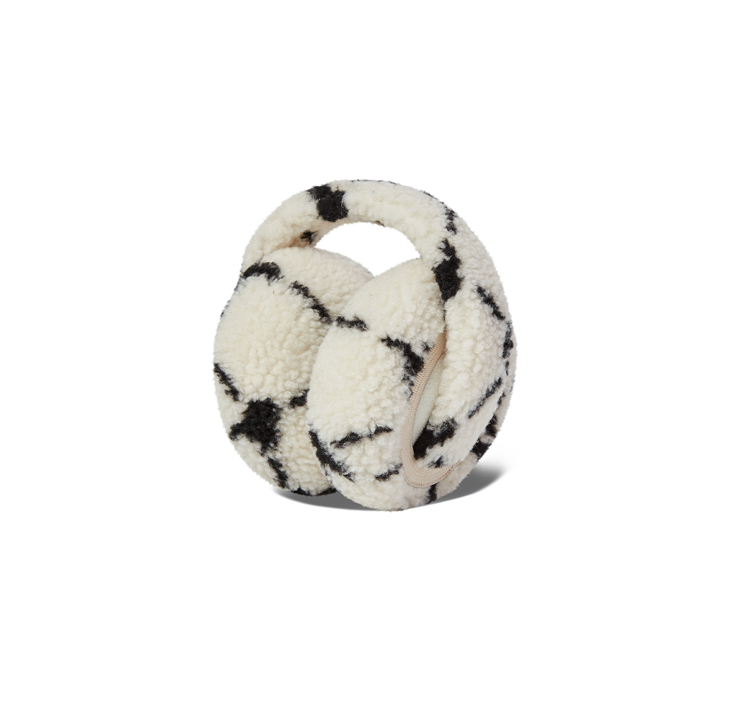 White and black textured ball toy on a white background