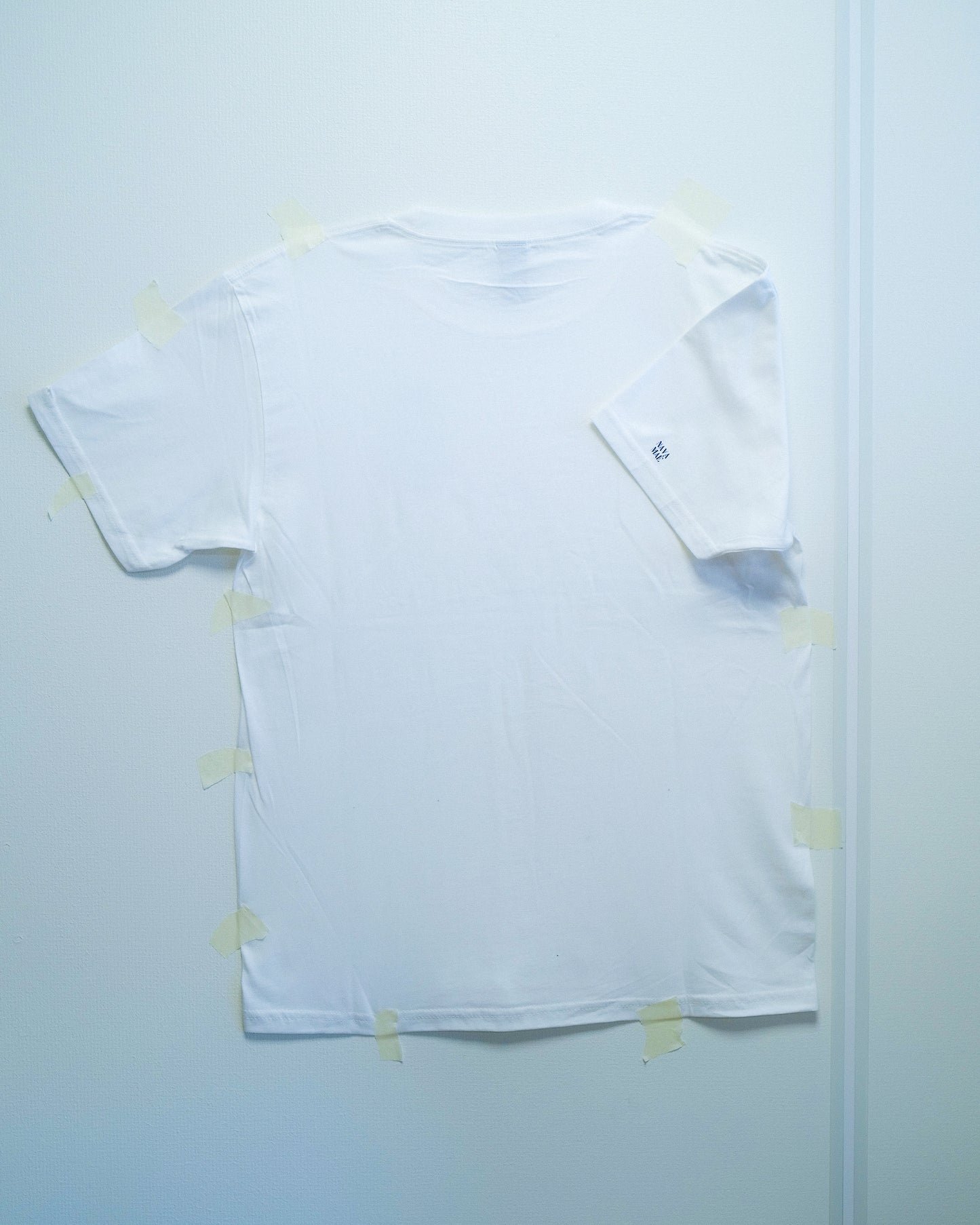 Nava Mae tshirt with logo on sleeve