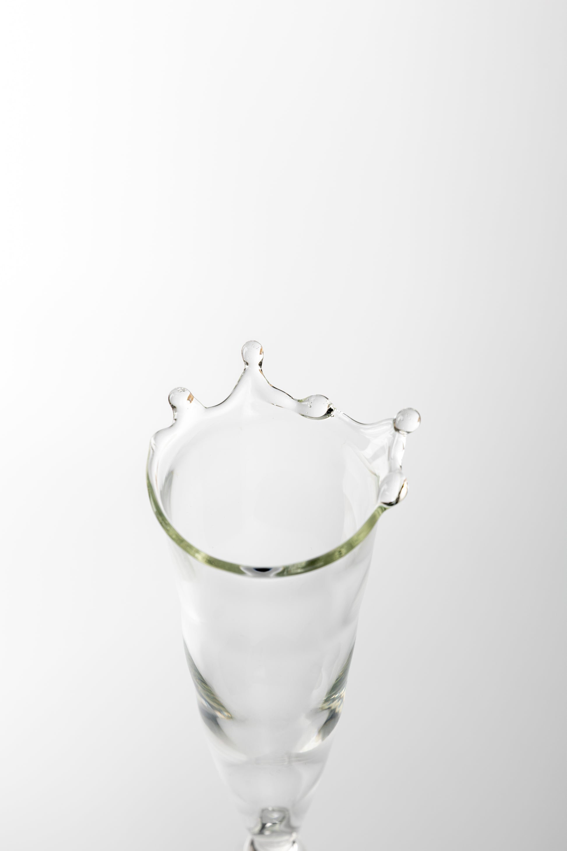 Top of Handmade champagne clear glass with water droplets 