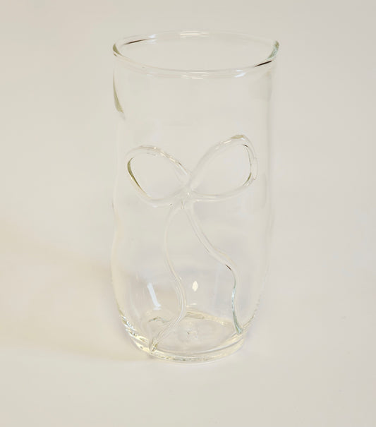 Handmade clear drinking glass with a ribbon