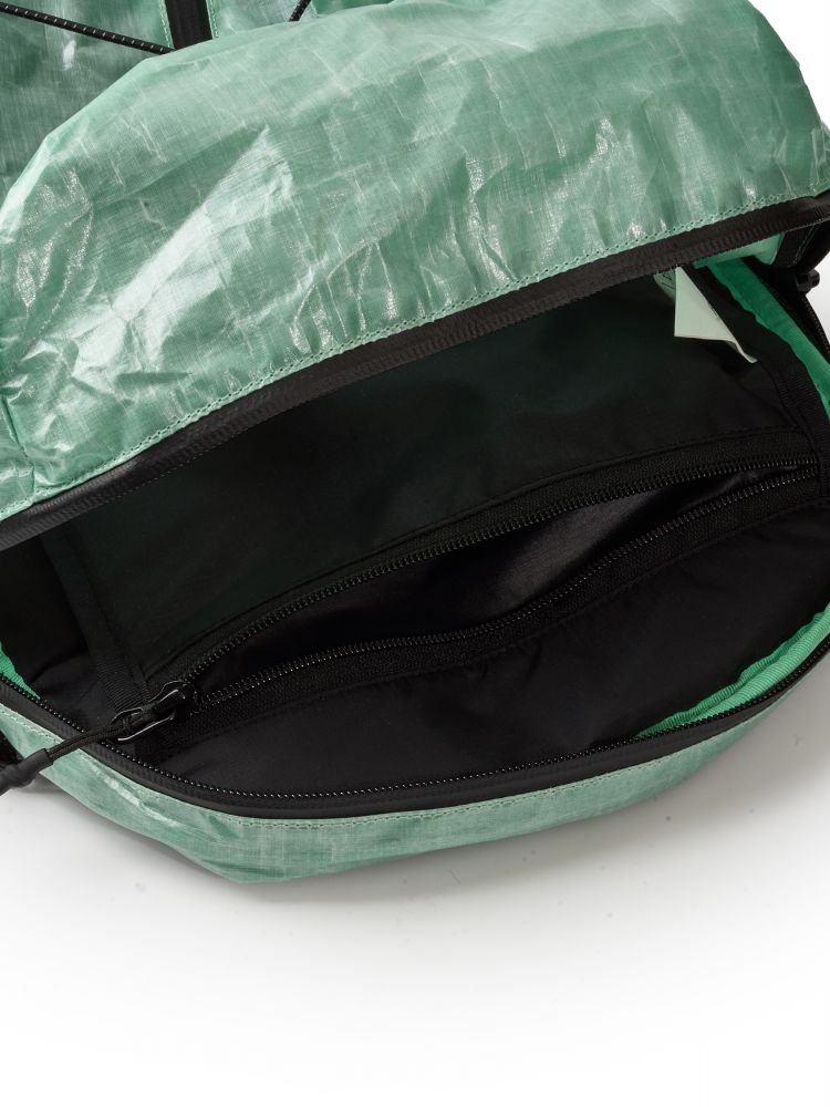 Mint Blue lightweight backpack with a black interior 