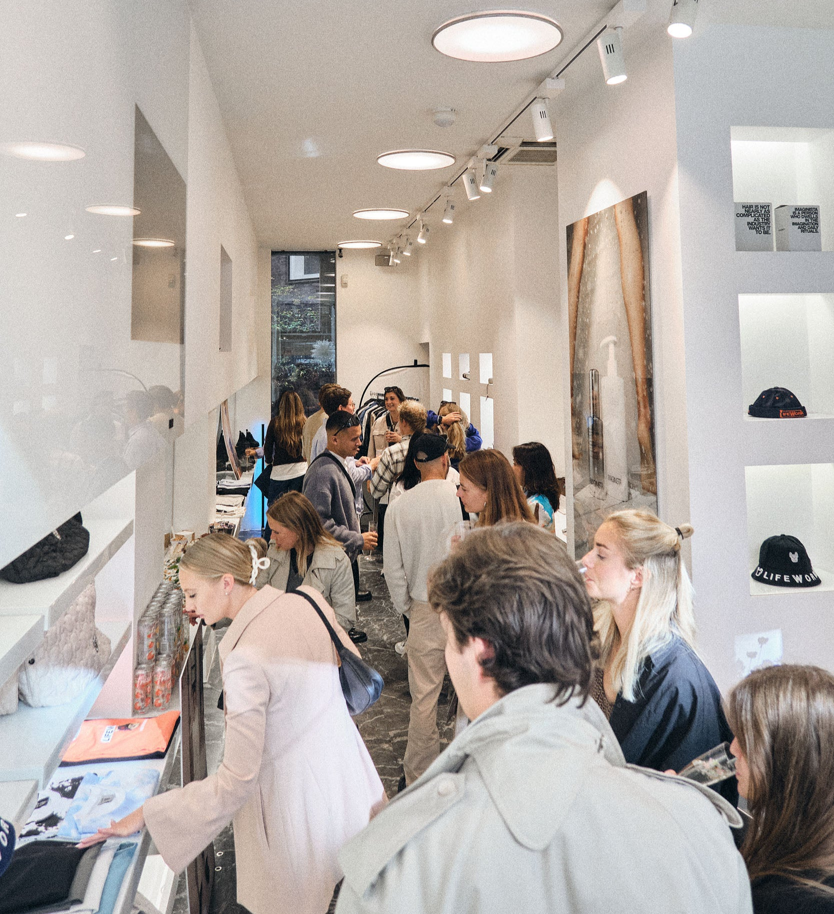 Guests browsing curated Korean fashion at the Nava Mae popup store in bredgade in central Copenhagen