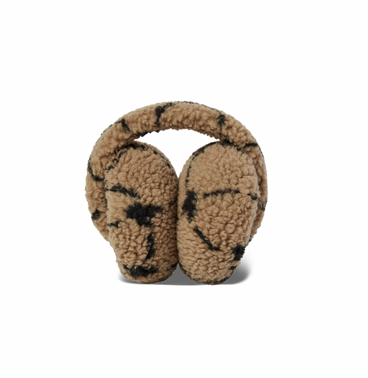 Pair of beige ear muffs with black pattern on a white background