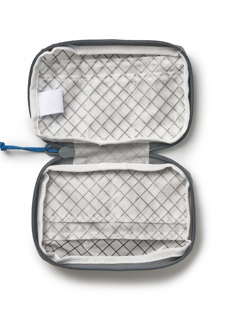 Open travel organizer pouch with grid pattern 